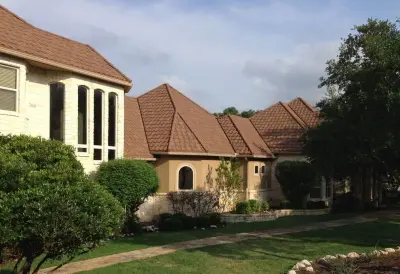 Wolfe-Gerard Tile and Metal Roofing — Roofing & Gutter Services project by Austin Roofing Contractors