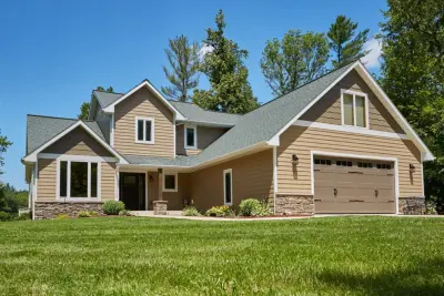 Cladding — Roofing & Gutter Services project by Red River Roofing Companies, Inc.