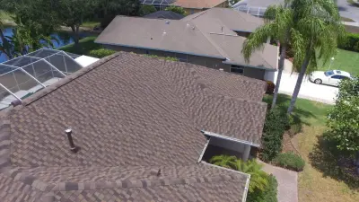 Sarasota Magnolia Pond Drive — Roofing & Gutter Services project by Sun Coast Roofing