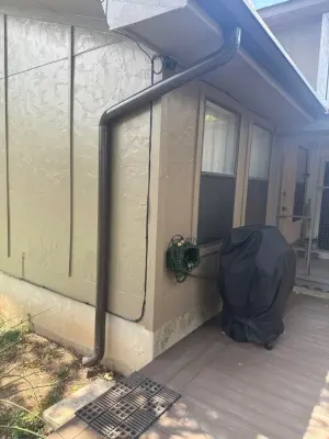 6-Inch Straight Gutters with LeafBlaster Pro and Rain Chain — Roofing & Gutter Services project by Austin Gutter King