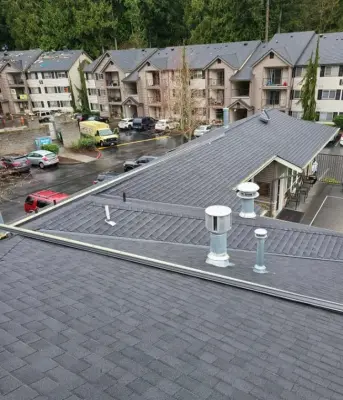 Residential Building Roof Replacement by Eastside Roofing Inc