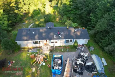 Zhumas Construction Inc - Roofing & Gutter Services in Billerica, MA