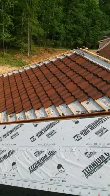 Augusta Steel with Stone Coating — Roofing & Gutter Services project by Precision Roofers, LLC