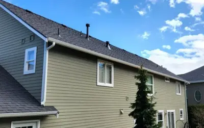 Fantastic new roofing and gutters in Camano. #greatamericangutterspnw by Eastside Roofing Inc