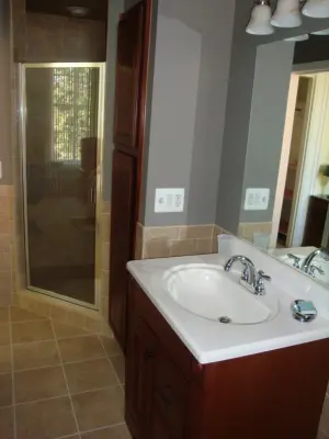 Orchard Lake Bathroom Remodeling — Roofing & Gutter Services project by Bloomfield Construction