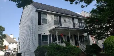GAF Timberline HD Charcoal Roofing Shingles — Roofing & Gutter Services project by WT Anderson Corp.