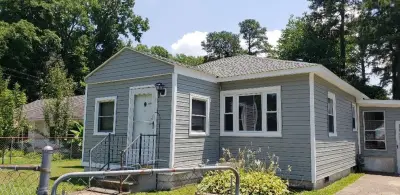 Encore .040 Seagrass Vinyl Siding by CertainTeed — Roofing & Gutter Services project by WT Anderson Corp.