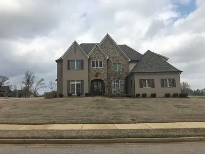 Tudor Brick — Roofing & Gutter Services project by Branch Supply Roofing