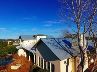 Capparelli - Vertical Seam Galvalume Metal Roofing — Roofing & Gutter Services project by Austin Roofing Contractors