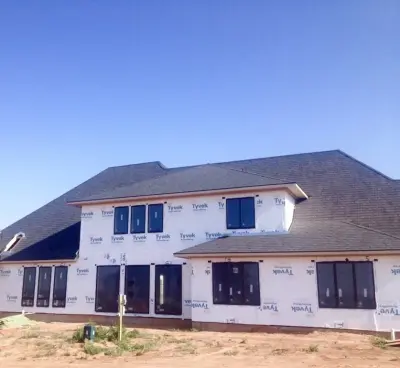 CertainTeed Grand Manor in Black Pearl color — Roofing & Gutter Services project by Rhoden Roofing