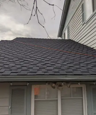 Presidential Roof in Charcoal Black — Roofing & Gutter Services project by Eastside Roofing Inc
