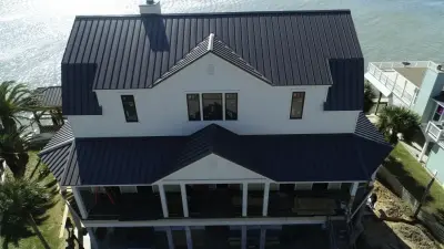 Tiki Island Texas Charcoal Gray Standing Seam Roof by Houston Metal Roofing Services