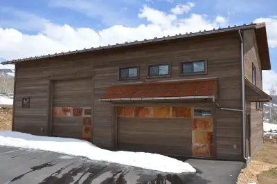 Rustic Half-Round Cold Roll Gutter — Roofing & Gutter Services project by Seamless Design Inc