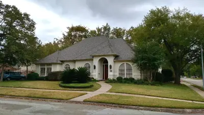 Finished Residences - Weathered Wood Hue — Roofing & Gutter Services project by Amstill Stilley Roofing
