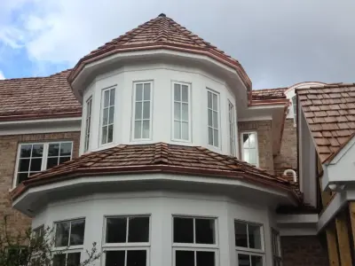 Barrington, IL Copper Gutter Installation — Roofing & Gutter Services project by Optimal Gutters Installation & Replacement