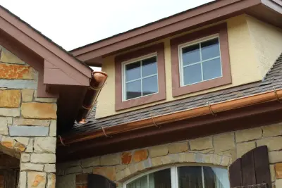 Copper Gutters on a Southwestern-Style Residence — Roofing & Gutter Services project by Austin Gutter King