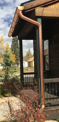 Half-Round Copper Gutter — Roofing & Gutter Services project by Seamless Design Inc