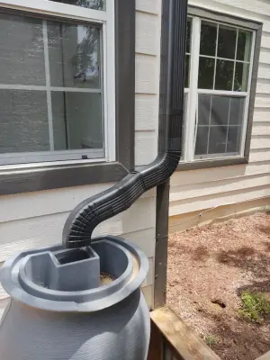Custom Gutters with Corrugated Downspouts — Roofing & Gutter Services project by Austin Gutter King