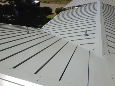 Metal Roof for Country Home — Roofing & Gutter Services project by Tugwell Roofing CO