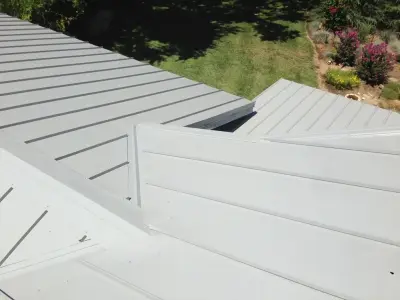 Metal Roofing for Country Homes — Roofing & Gutter Services project by Tugwell Roofing CO