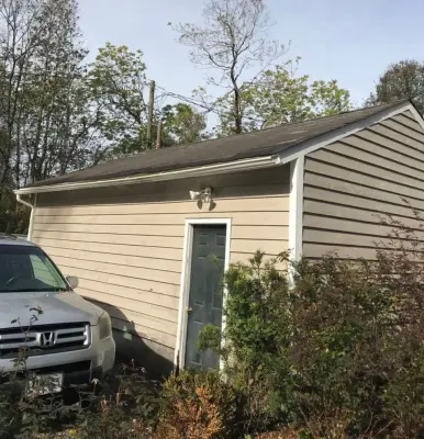 Separate Garage — Roofing & Gutter Services project by Patriot Roofing Company