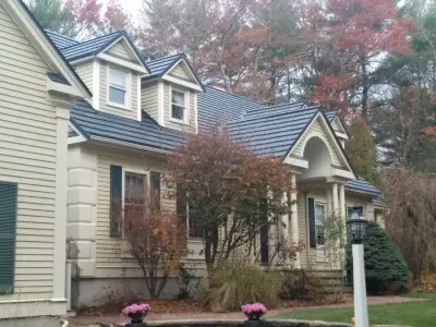 Dover, MA. Blended Rustic Aluminum Shake and Standing Seam Roofing. by Classic Metal Roofs, LLC