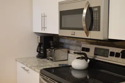 Urban Condo Culinary Space — Roofing & Gutter Services project by A-Team Construction Unlimited Inc.