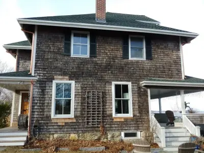 Plymouth, MA Fiberglass Gutter with Copper Downspouts — Roofing & Gutter Services project by Gutter Pro Enterprises