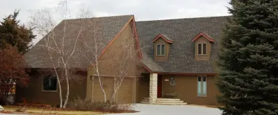 Weddle & Sons Inc - Roofing & Gutter Services in Manhattan, KS