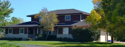 Weddle & Sons Inc - Roofing & Gutter Services in Manhattan, KS