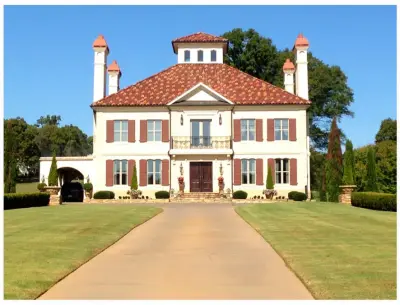 Quad-color clay style blended roof — Roofing & Gutter Services project by R W Stokes Enterprises