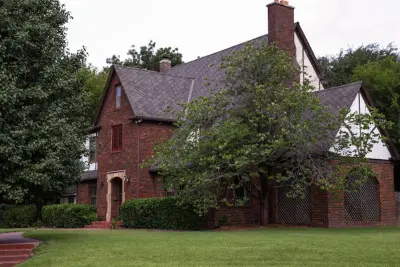 GAF Sienna shade Aged Oak — Roofing & Gutter Services project by Rhoden Roofing