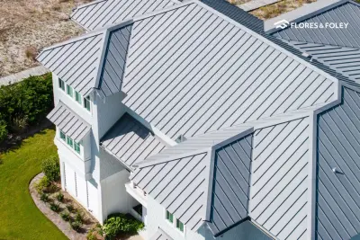 Gray Standing Seam Metal Roofing over the Intracoastal in Wilmington, NC — Roofing & Gutter Services project by Flores & Foley Roofing + Sheet Metal