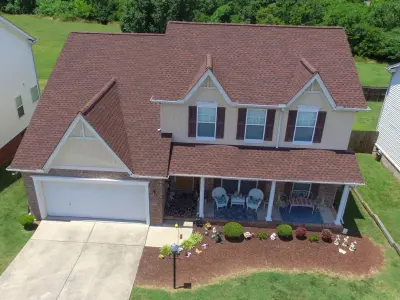 Hickory - Owens Corning Duration Roof Shingle — Roofing & Gutter Services project by Tim Leeper Roofing