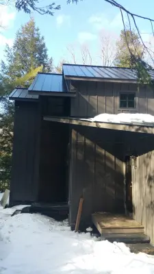 Lake Garfield Hardie Board Siding and Standing Seam Installation — Roofing & Gutter Services project by J Smegal Roofing & Renovations