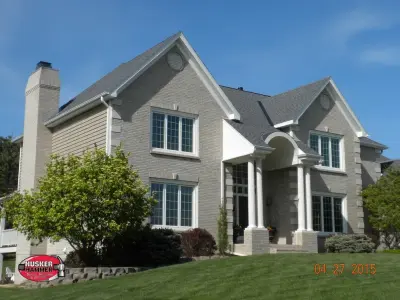 Lincoln Region - Roofing — Roofing & Gutter Services project by Husker Hammer Siding Windows And Roofing
