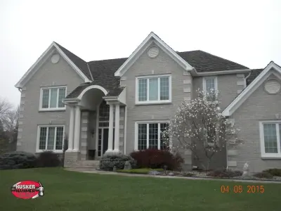 Husker Hammer Siding Windows and Roofing - Roofing & Gutter Services in Elkhorn, NE