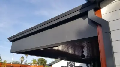 Contemporary Craftsman Home with Matte Black Standing Seam Metal Roof — Roofing & Gutter Services project by Western States Metal Roofing