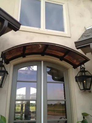 Roofing with Metal and Shingles — Roofing & Gutter Services project by Acadiana Gutter & Patio LLC