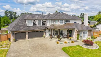 Contemporary Farmhouse Metal Roof Combination in Orting, WA by Valentine Roofing