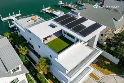 Contemporary TPO Roof at Wrightsville Beach – Highlighted on The Waterfront — Roofing & Gutter Services project by Flores & Foley Roofing + Sheet Metal