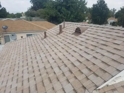 Innovative Cool Roof — Roofing & Gutter Services project by SLR Roofing