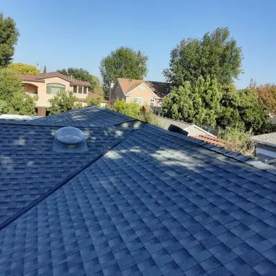 Skylight Installation with New Roof — Roofing & Gutter Services project by Moctezuma Roofing Inc.
