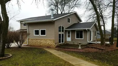Northwood, Iowa - A Fresh Home at the Familiar Address — Roofing & Gutter Services project by Midwest Construction & Supply INC