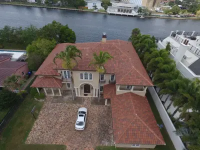 Fort Lauderdale Orange Tile Roofing — Roofing & Gutter Services project by Evans Roofing