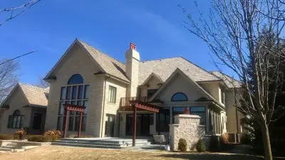 Sparks Construction LLC - Roofing & Gutter Services in Hudson, IL
