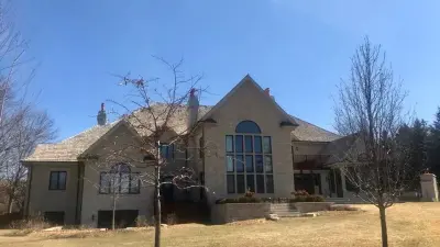 Sparks Construction LLC - Roofing & Gutter Services in Hudson, IL