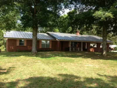 LMC Roofing & Construction - Roofing & Gutter Services in De Kalb, TX