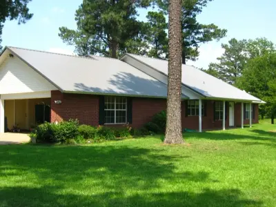 LMC Roofing & Construction - Roofing & Gutter Services in De Kalb, TX