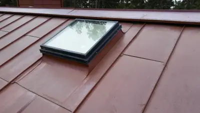 Copper Roof with Standing Seam at Pebble Beach — Roofing & Gutter Services project by Kroeck And Son's Slate Roofing